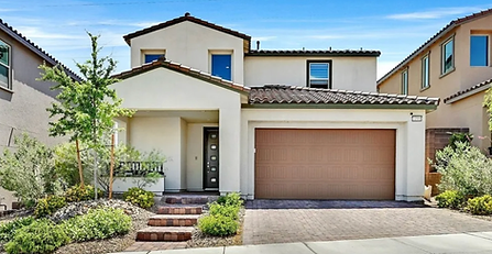 Paint N More exterior painters working on a Las Vegas stucco home