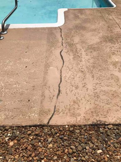 Pool deck crack repair before resurfacing by Paint N More in Las Vegas