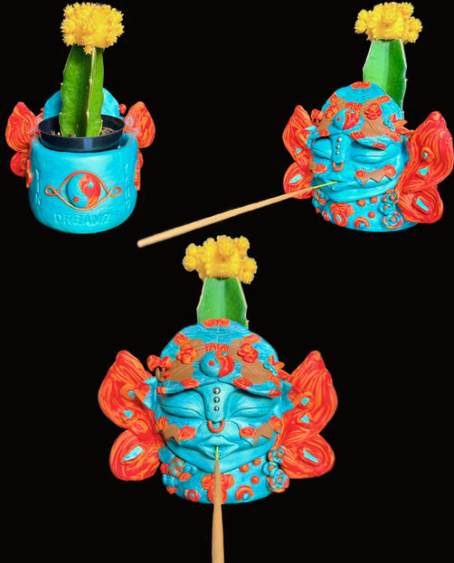 Turquoise with red, orange and brown polymer clay face planter and incense holder with butterfly shaped wing ears