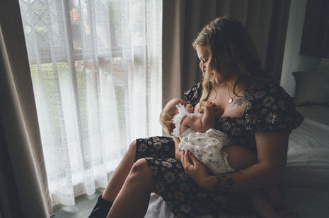 Candid moments from a combined first‑birthday and surprise wedding: child with cake, parents exchanging vows, family hugging, and joyful guests in a garden setting.