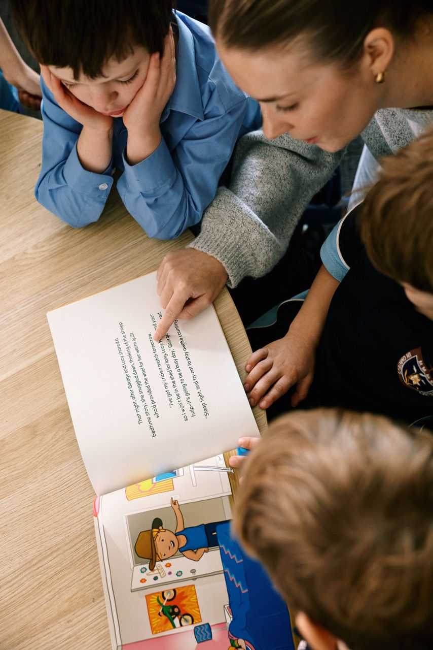 George the Farmer author Simone Kain reading with kids in the classroom. IMAGE: Supplied.