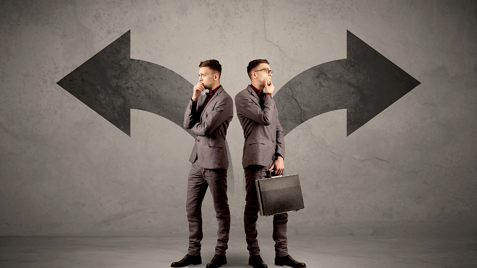 A businessman standing at a fork in the road facing multiple directions, representing the sales inconsistency that results from lacking ideal customer profile clarity and a defined market focus