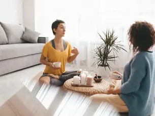 Two women having a quiet conversation