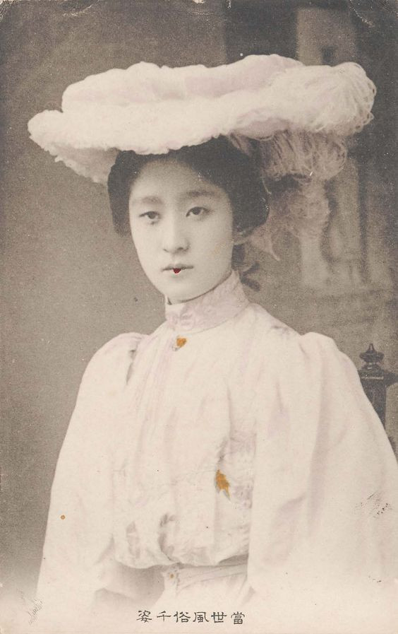 Japanese woman in Western dress cookingwiththehamster