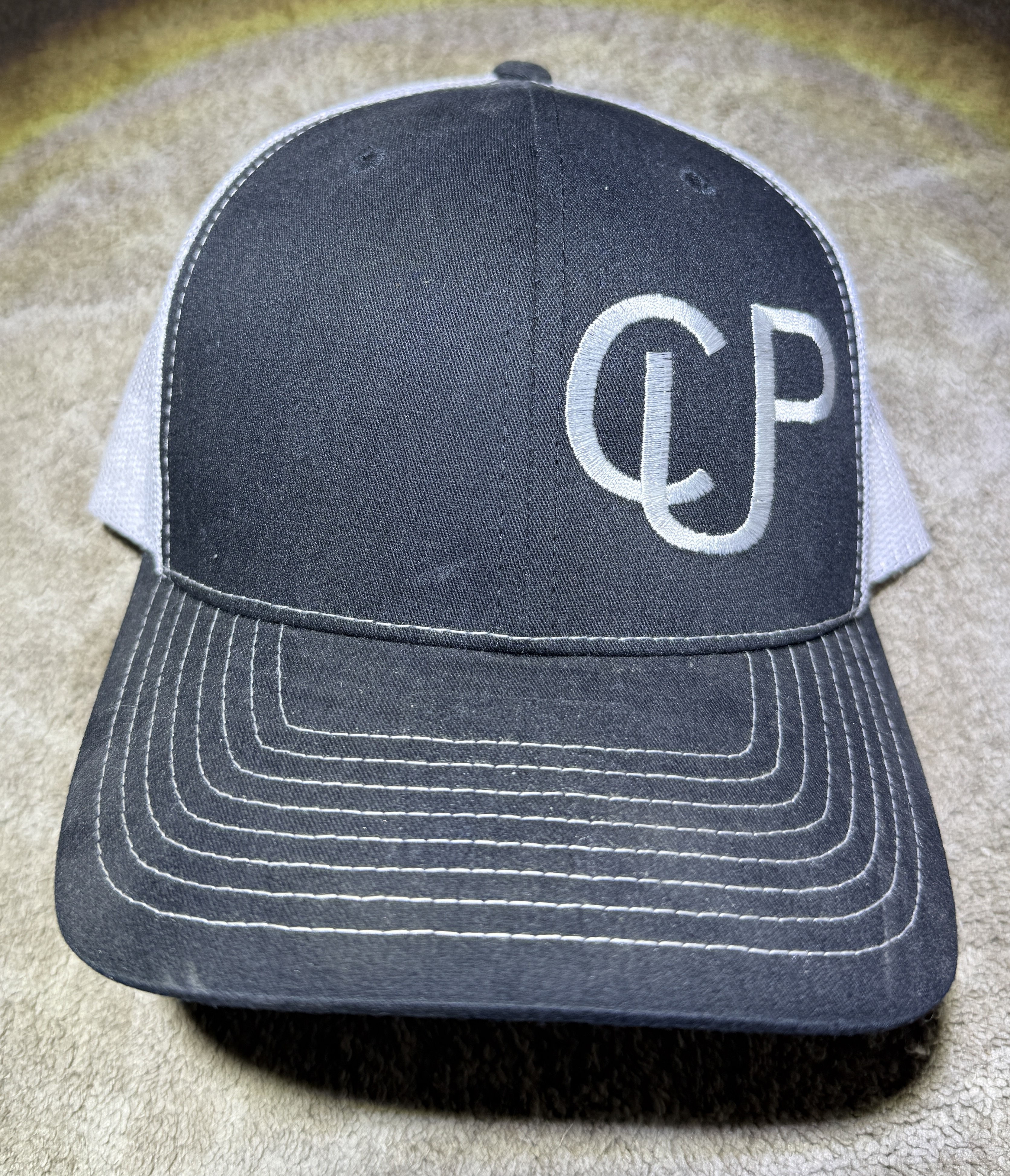 The CUP hat black or blue