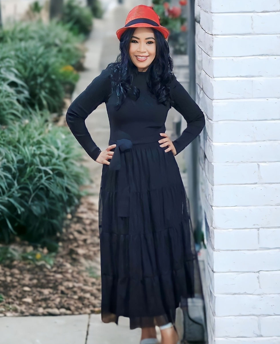 Black midi sweater dress with tulle.