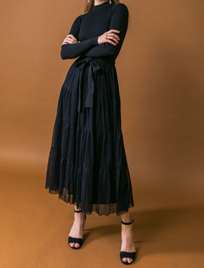 Thumbnail: Black midi sweater dress with tulle.