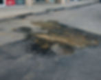 Water can lead to all kinds of pavement damages, especially where it pools