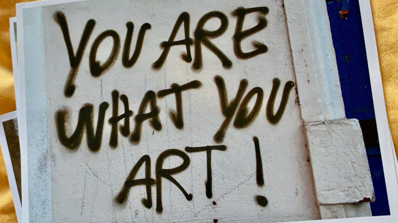 paper with "your are what you art" written on it