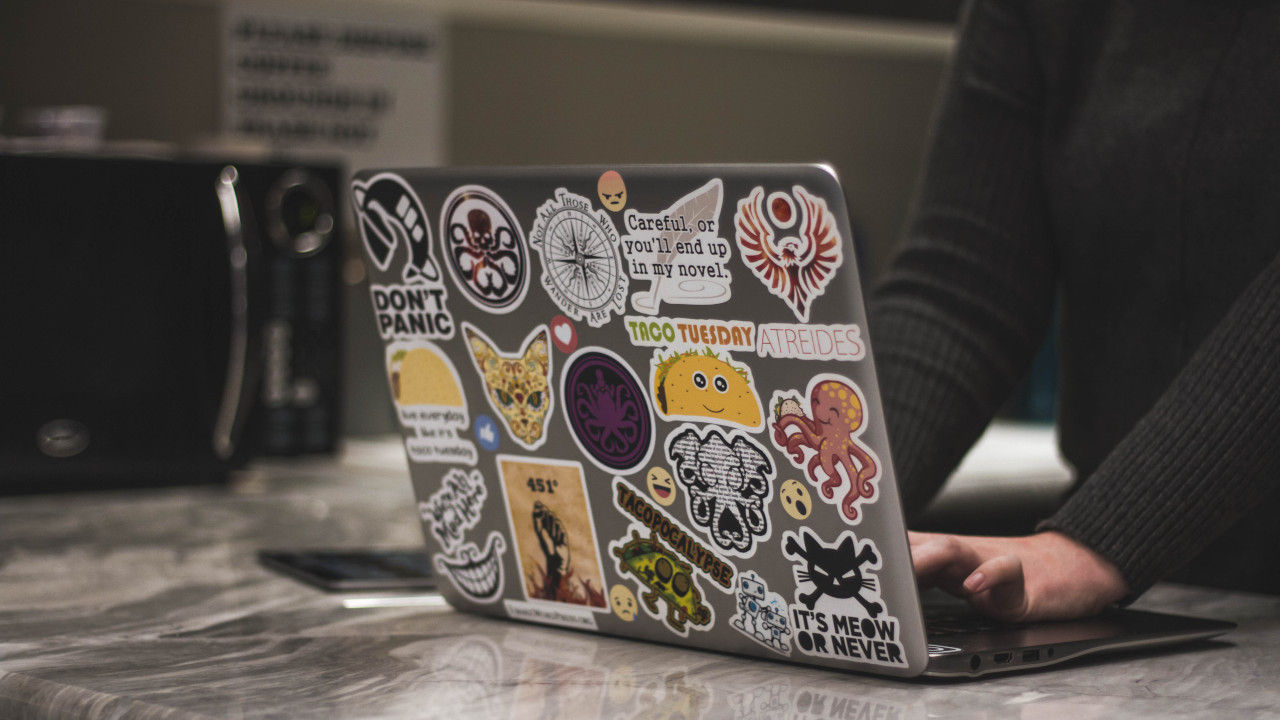woman typing on a laptop