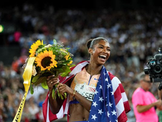 Russell breaks world 100m hurdles record in Zurich