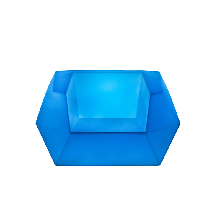 Blue illuminated LED lounge chair with a geometric silhouette, angular arms, and a modern contemporary design.