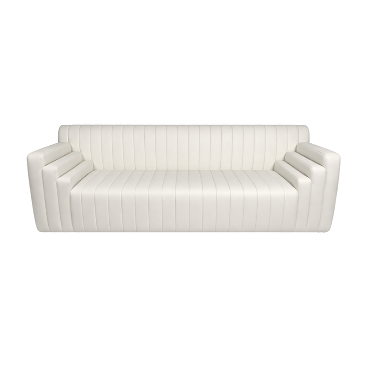 White leather loveseat with vertical channel tufting and a modern silhouette for luxury event lounges.