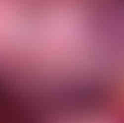 So Gorg fashion themed Bat Mitzvah table design with pink florals, candles, and draped backdrop at Platform Thirty in Philadelphia