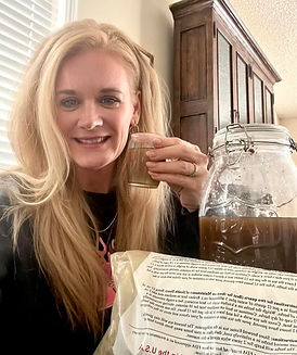 42f41365e6d6f600cbc54302e1503c2c_Woman drinking Essiac.JPG