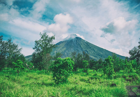 Small clouds drifting over Mount Karisimbi in Rwanda