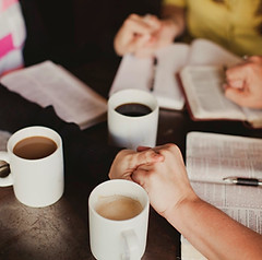 women-holding-hands-bible-study.jpg
