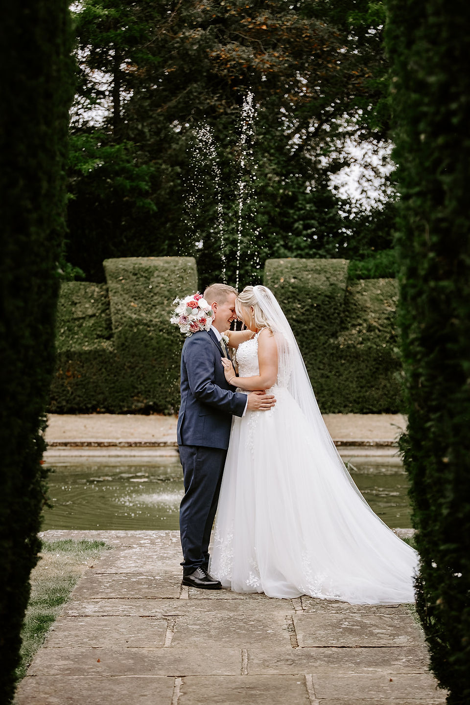 Relaxed couple portraits in natural light at Horwood House