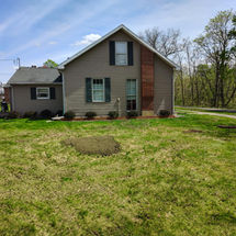 Yard after stump grinding by Tri-State Tree Service in Quincy, IL