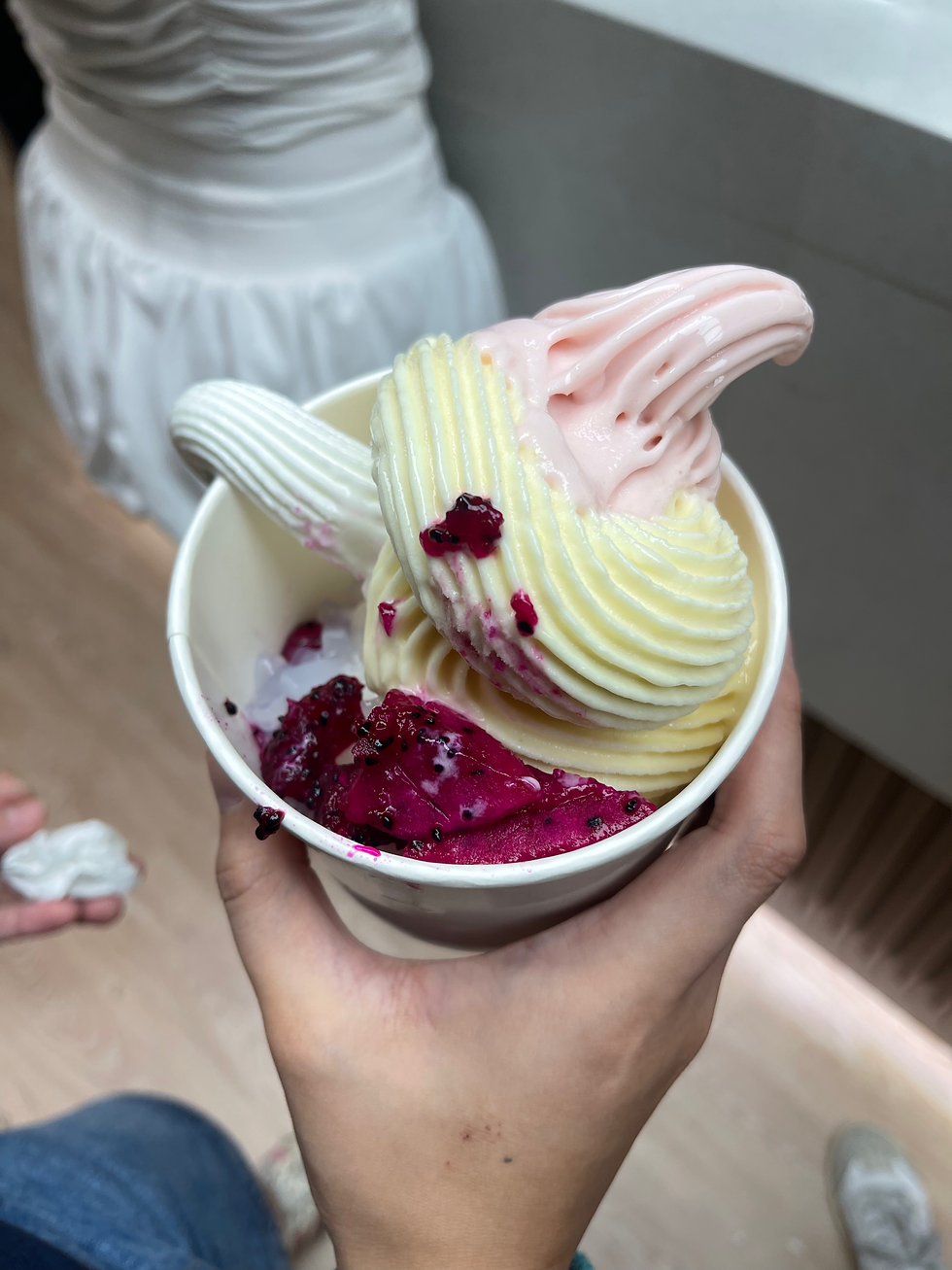 This was Jamie's froyo, it consists of straberry, pineapple, and plain. The toppings include dragon fruit and coconut jelly. It's looking a little odd, but don't judge a froyo by its appearance.