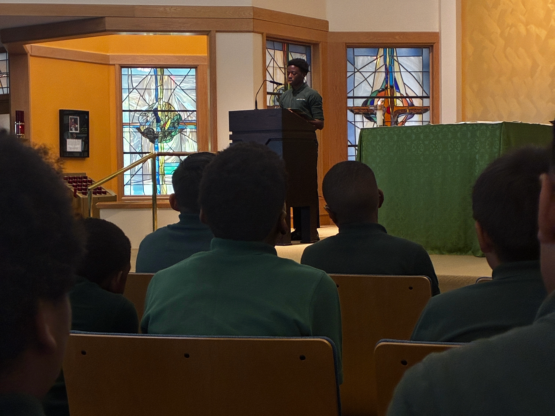 Student speaking at church