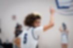 Willow Canyon Basketball player in a number 5 jersey looks back over shoulder while holding index finger in the air