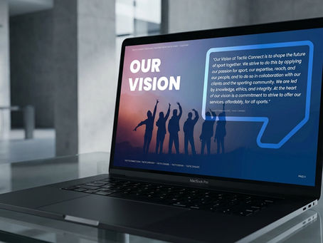 Our vision page of the brochure displayed on a laptop computer screen.