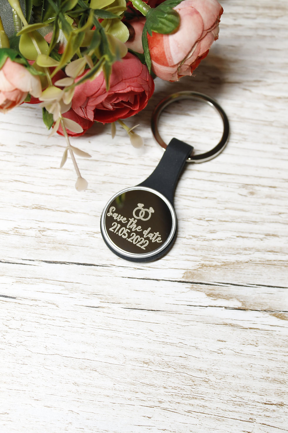 Personalised round metal keyring with rubber edge