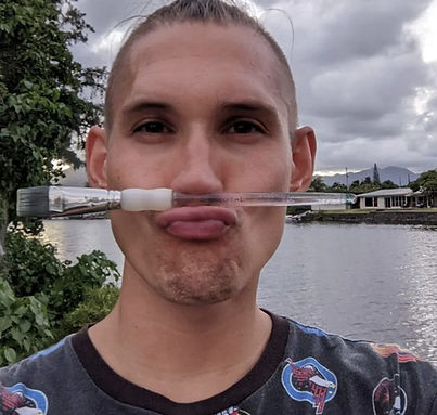 Certified Instructor Brad G. with a paint brush balancing on his nose