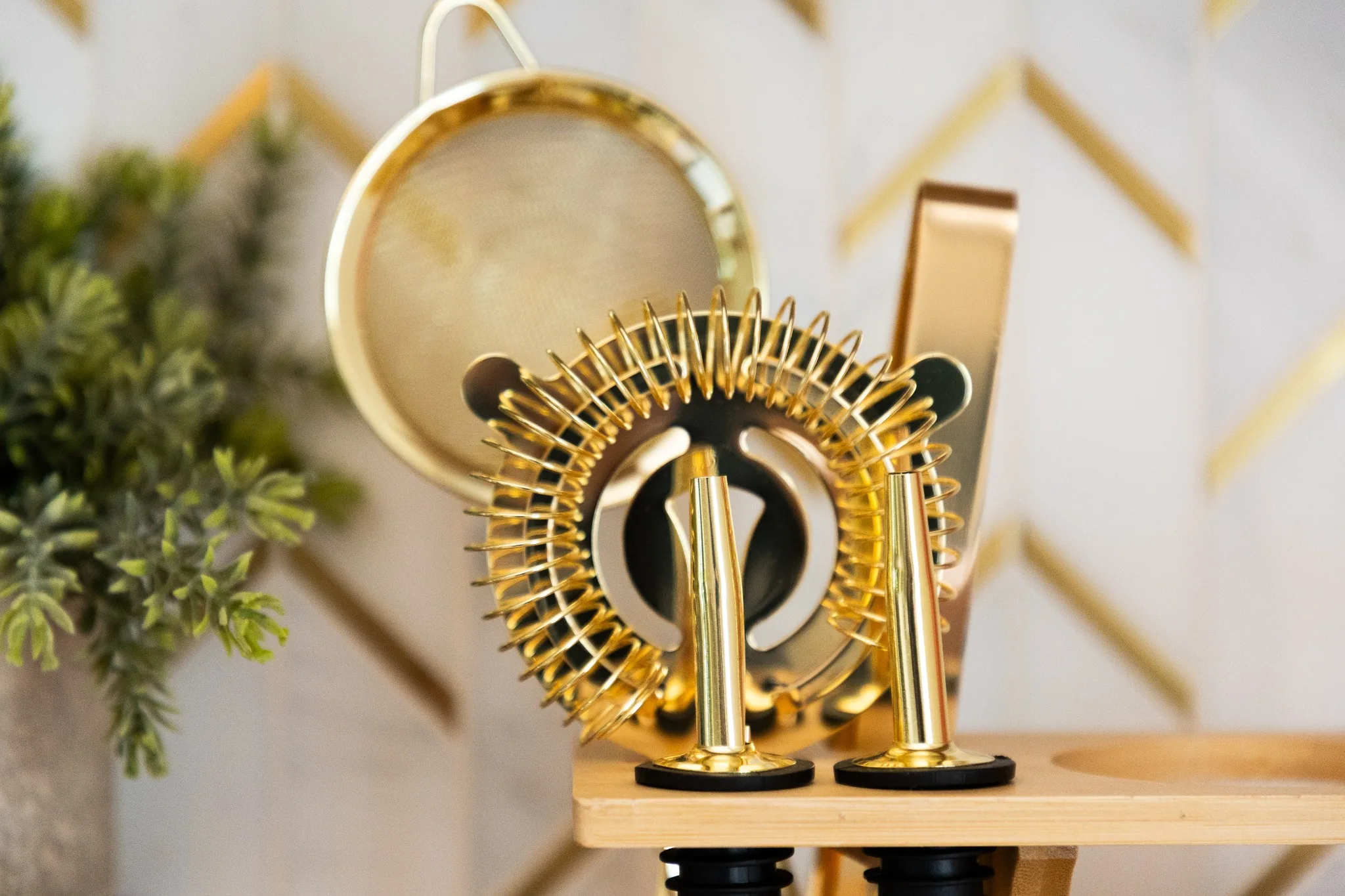 Styled decor detail shot with a gold mirror on a console table