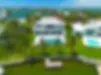 bayfront-mansion-with-dock-and-pool.webp