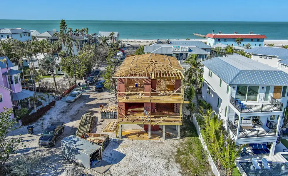 Aerial view of beachfront home under construction near Gulf of Mexico