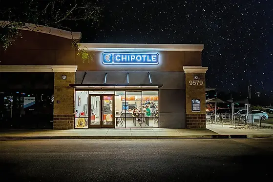 chipotle-restaurant-storefront-night-exterior.webp
