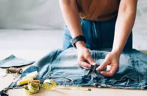 bigstock-Woman-Repairs-Sews-Reuses-Fabr-413837765.jpg.webp