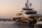 luxury tourists disembarking from a luxury yacht in Saint-Tropez before getting into a cha