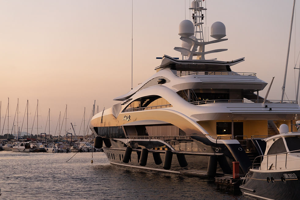 luxury tourists disembarking from a luxury yacht in Saint-Tropez before getting into a cha