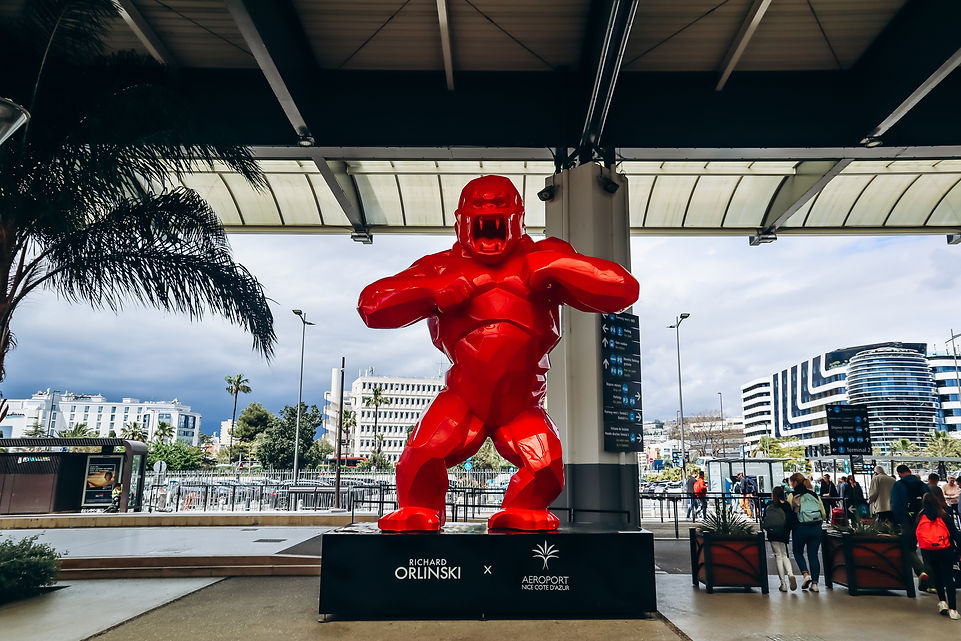 Tourists with luggage arriving at Nice Côte d’Azur Airport on the French Riviera