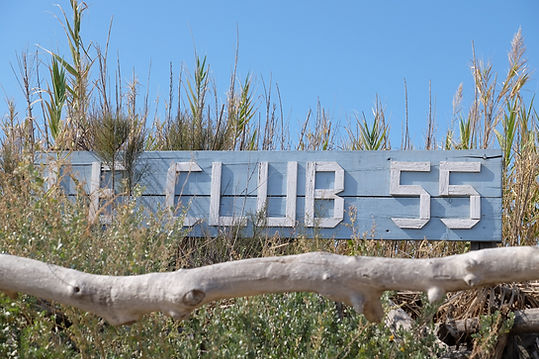 A limousine driver in a Mercedes van parked in front of Club 55 in Ramatuelle on the Rivie