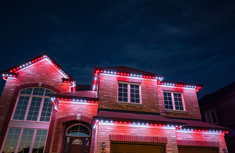 Permanent LED lighting on a Vancouver Island waterfront home, offering RGB color customization, smartphone app control, and d