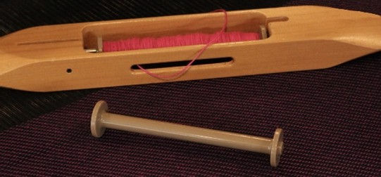 Boat shuttle with a bobbin.jpg