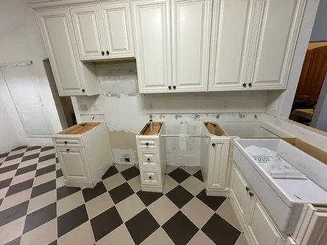 Bright kitchen featuring all-wood shaker style cabinets