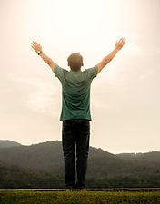 Standing With Arms Stretching Out To Sky