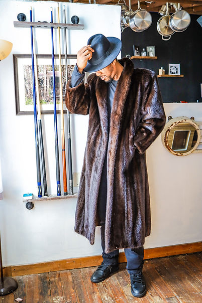 Man in long fur coat