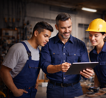 Technicians learning from a journeyman