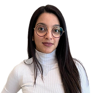 Woman in white turtleneck and glasses