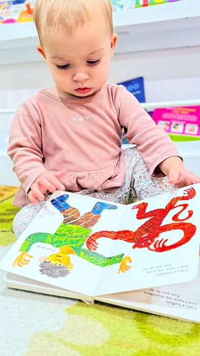 infant reading book