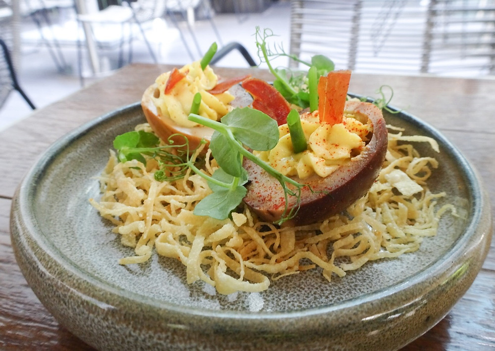 Food at The Envoy restaurant and bar at The Pottinger Hotel Hong Kong