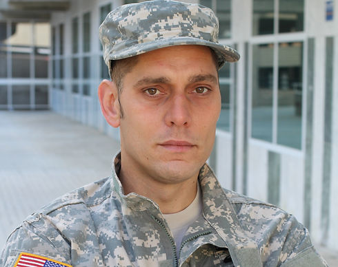 Army Soldier Deep in Thought with Arms Crossed_edited.jpg