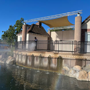 Hot water pressure washing at Cerritos Park stage