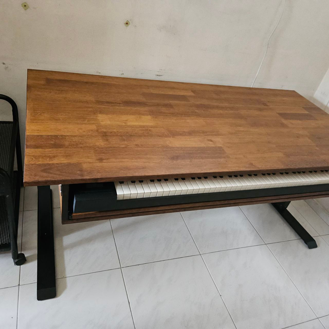 adjustable height desk with piano pullout tray in walnut colour solid wood tabletop